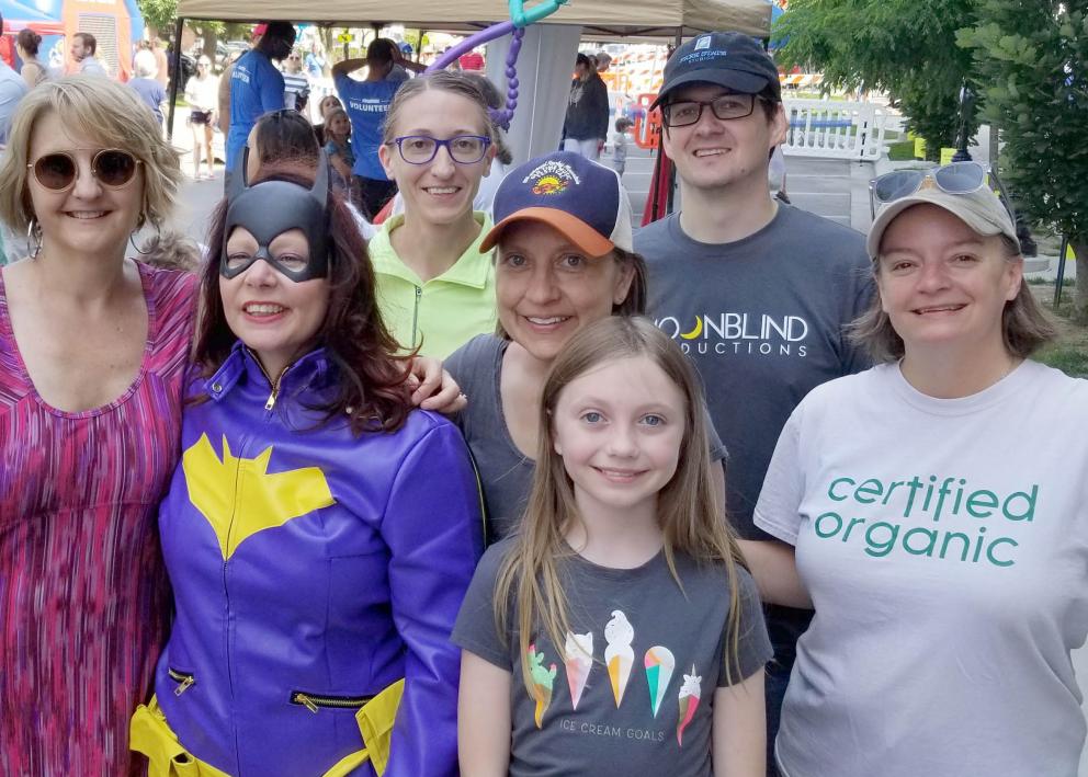 We are dedicated to supporting efforts around our community. Jackie, Erika, Sean, Teri, and Virginia (with her daughter) gathered around our very own Batgirl, Bridget, as she scaled a building in support of the Boys and Girls Club.