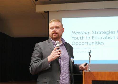 Assistant Director Michael Lemon presenting at the KEYS Summit in 2018.